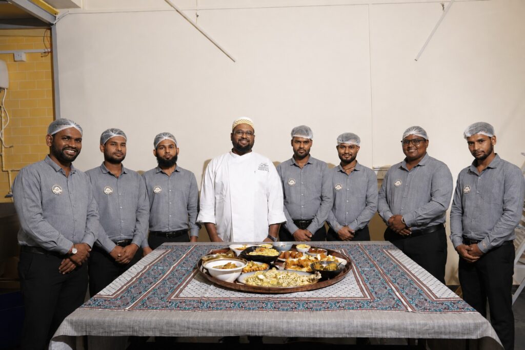The Bohri Food Co. team preparing authentic Bohri dishes in Mumbai